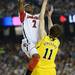 Michigan freshman Nik Stauskas guards Louisville junior Russ Smith in the first half of the national championship game at the Georgia Dome in Atlanta on Monday, April 8, 2013. Melanie Maxwell I AnnArbor.com